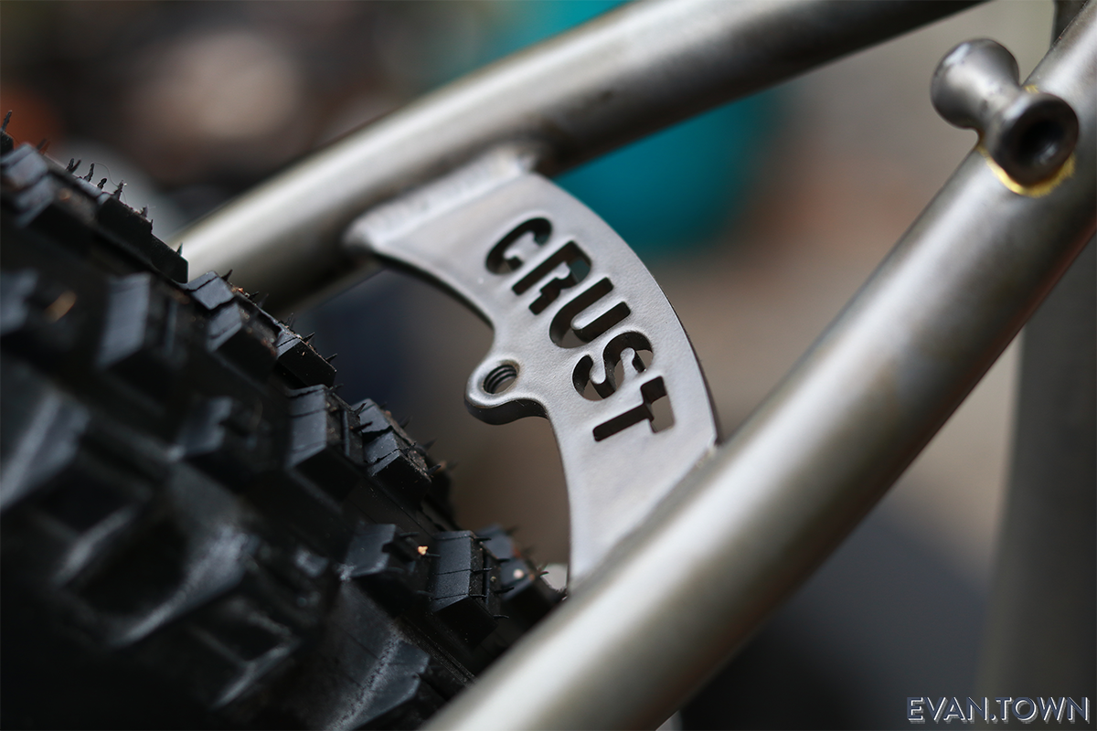 Crust Evasion seat stay logo